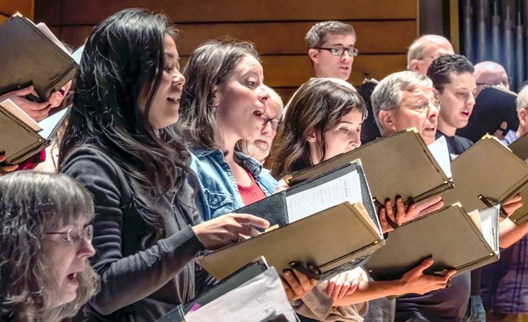 Southern Oregon Repertory Singers, seen here in rehearsal, will perform new works May 13-14 in its annual James M. Collier First Light Festival.