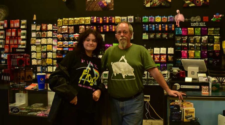 Customer Will Sharrer and Plectrum Music owner Daniel Porter both happen to have on Pink Floyd shirts. Ashland.news photo by Morgan Rothborne