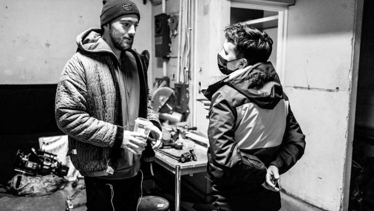 Filmmaker and director Dan Brown, right, confers with star Angus Cloud prior to shooting a scene in the thriller, "Your Lucky Day," showing at 8 p.m. Thursday at Ashland's Varsity Theatre. Nick Pezzillo photo