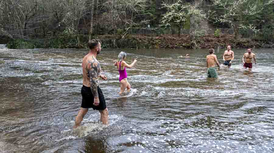 About 20 people participated in the polar plunge at 8 a.m. New Year's Day. Ashland.news photo by Bob Palermini
