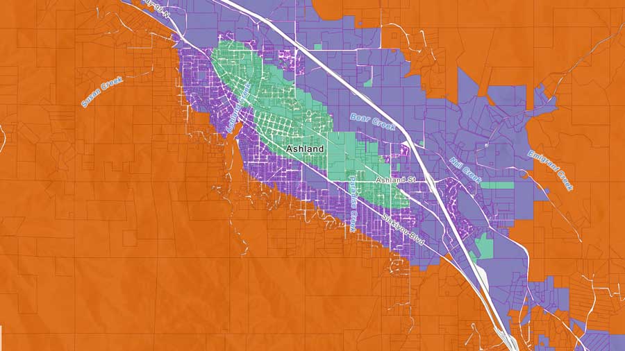 The updated wildfire hazard map shows low, moderate and high hazard areas in green, purple and brown, respectively. The maps can be viewed online on Oregon Explorer; they will be updated about every five years.