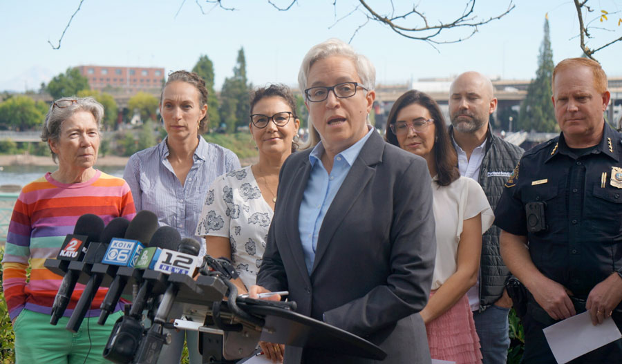 Gov. Tina Kotek stands with Portland leaders and Portland Police Chief Bob Day at a press conference in Portland, Oregon, on Saturday, Sept. 27, 2025. Kotek said she told President Donald Trump and Homeland Security Secretary Kristi Noem in a phone call that federal troops are not needed to police Portland following Trump’s social media post that he’d intervene in the “war ravaged” city. Oregon Capital Chronicle photo by Alex Baumhardt