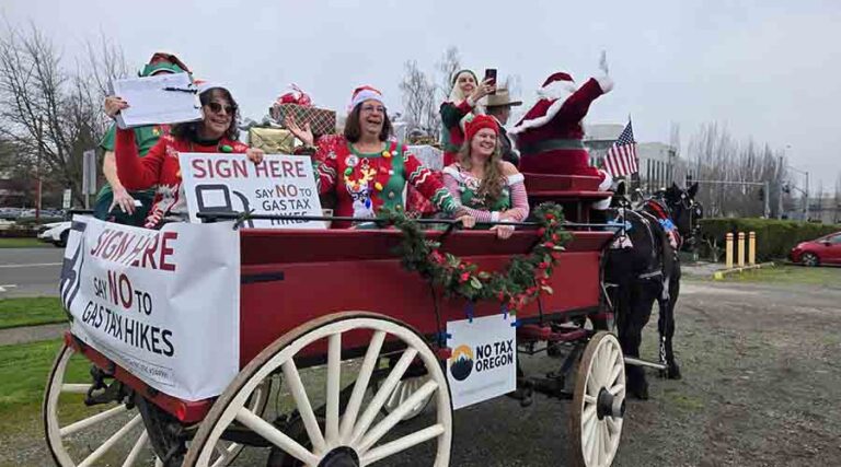 No Tax Oregon delivered nearly 194,000 signatures — wrapped like Christmas presents and delivered by horse-drawn wagons — to Secretary of State Tobias Read’s office. Rep. Ed Diehl courtesy photo