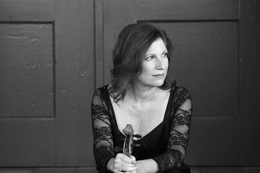 Carla Ecker, concertmaster with the Rogue Valley Symphony, also plays for the Phoenix, Arizona, Symphony and the Santa Fe Opera Orchestra. Next up for Ecker and the RVS is the holiday pops concert, "A Judy Garland Christmas," Dec. 19-21 at OSF's Angus Bowmer Theatre. Photo by Christopher Briscoe