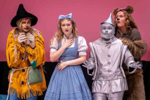 Jonas-Kai Green is the Scarecrow, Zinnia Merwin is Dorothy, Ethan Stachel is the Tinman and Sixten Ljungkvist is the Lion in the Emerald cast version of “The Wizard of Oz” at Ashland High School. Ashland.news photo by Bob Palermini